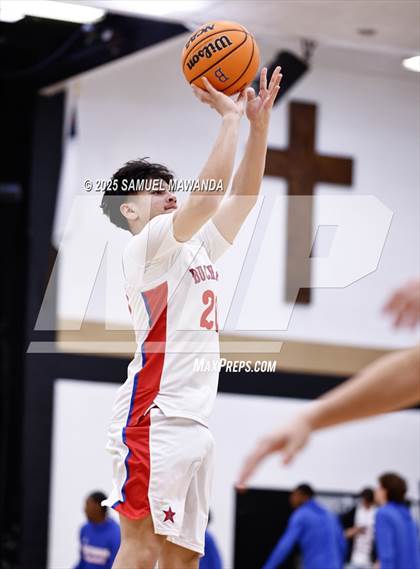 Thumbnail 1 in Buchanan vs Windward (Warrior Holiday Showcase) photogallery.