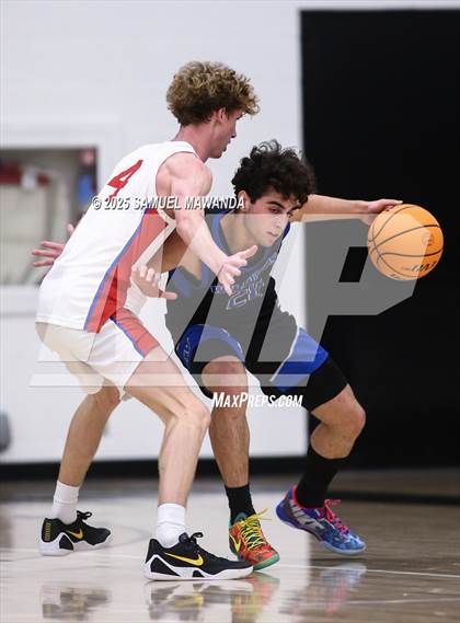 Thumbnail 2 in Buchanan vs Windward (Warrior Holiday Showcase) photogallery.