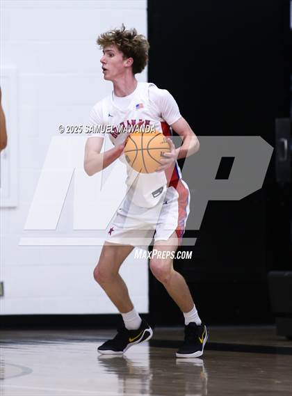 Thumbnail 1 in Buchanan vs Windward (Warrior Holiday Showcase) photogallery.