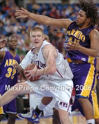 Modesto's Ryan Vermeulen snags a rebound, clinching a Panther victoy over Armijo.