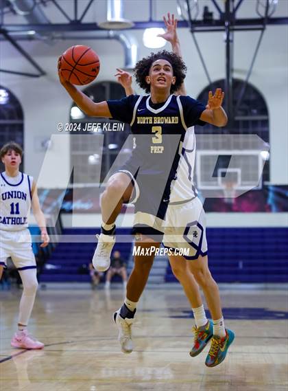 Thumbnail 1 in North Broward Prep vs Union Catholic (Miami Holiday Invitational) photogallery.