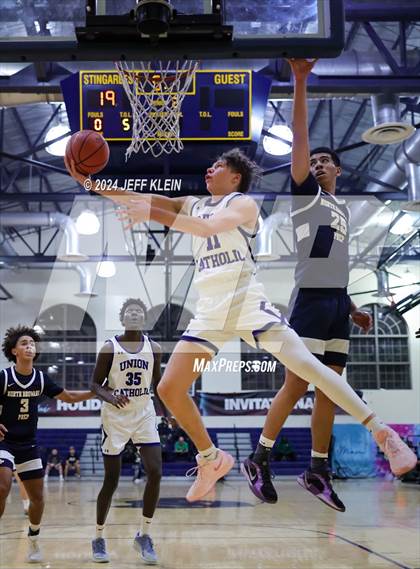 Thumbnail 2 in North Broward Prep vs Union Catholic (Miami Holiday Invitational) photogallery.