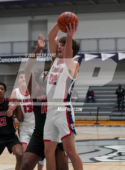 Thumbnail 1 in Plainfield vs North Central (Sneakers for Santa Shootout) photogallery.