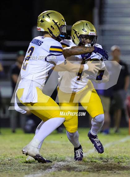 Thumbnail 3 in Saint Thomas @ Atlantic (FHSAA 5A District 14 Regional Final) photogallery.