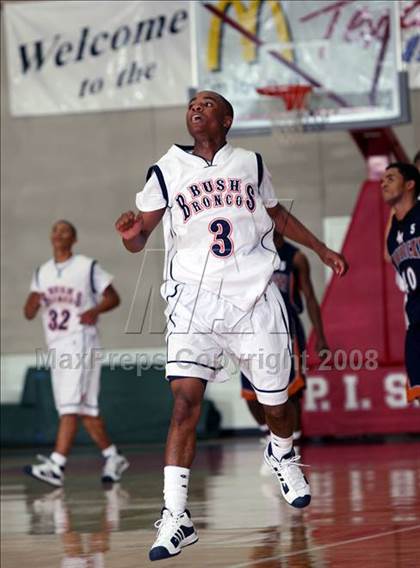 Thumbnail 2 in Bush vs. Madison (McDonald's Texas Invitational) photogallery.