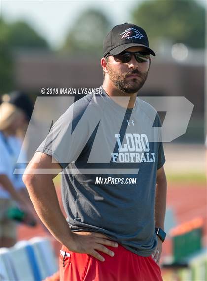 Thumbnail 1 in Langham Creek Spring Game (Black vs. White) photogallery.