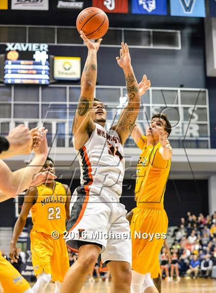 Thumbnail 2 in Wilmington vs. Archbishop Moeller (OHSAA Southwest Regional Playoff) photogallery.