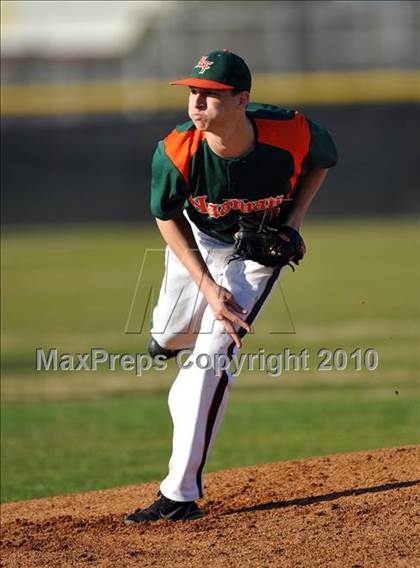 Thumbnail 2 in Naaman Forest vs. Trinity Christian (Carrollton Diamond Classic) photogallery.