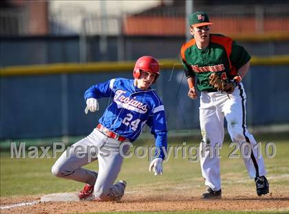 Thumbnail 2 in Naaman Forest vs. Trinity Christian (Carrollton Diamond Classic) photogallery.