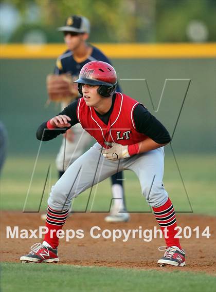 Thumbnail 3 in Lake Travis@ Stony Point (5A Region 2 Bi-district) photogallery.