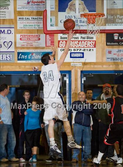 Thumbnail 2 in Clovis East vs. Centennial (Modesto Christian Holiday Hoops)  photogallery.