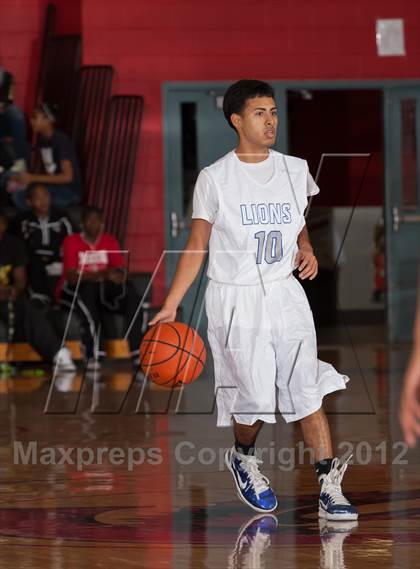 Thumbnail 2 in Turner [R. L.] vs Denton (Carrollton-Farmers Branch Basketball Classic) photogallery.