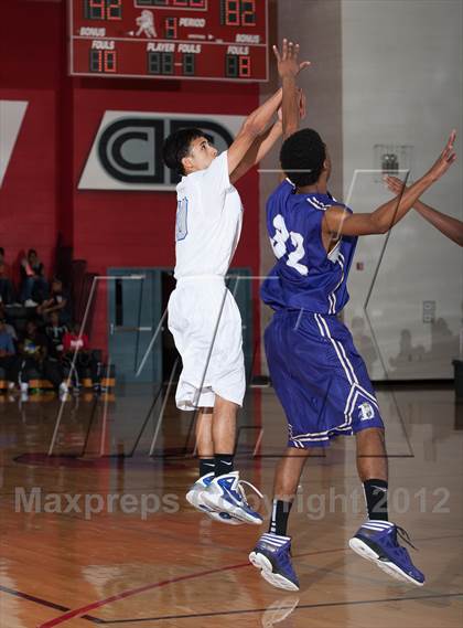 Thumbnail 1 in Turner [R. L.] vs Denton (Carrollton-Farmers Branch Basketball Classic) photogallery.