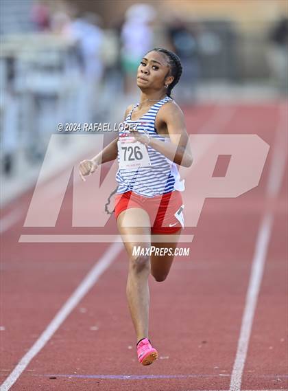 Thumbnail 3 in UIL Track & Field 6A Region 3 Regional Final Preliminaries (200 Meter) photogallery.
