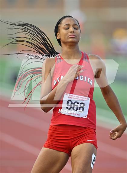 Thumbnail 3 in UIL Track & Field 6A Region 3 Regional Final Preliminaries (200 Meter) photogallery.