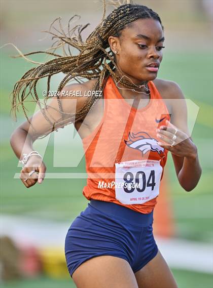 Thumbnail 3 in UIL Track & Field 6A Region 3 Regional Final Preliminaries (200 Meter) photogallery.