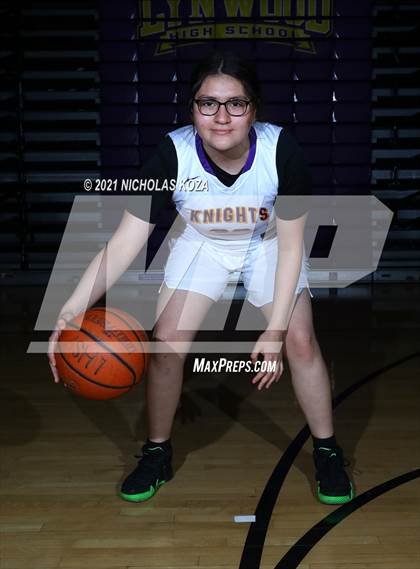 Thumbnail 3 in Lynwood Varsity Basketball Photo Shoot photogallery.