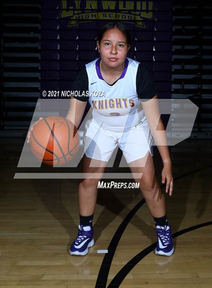 Thumbnail 3 in Lynwood Varsity Basketball Photo Shoot photogallery.
