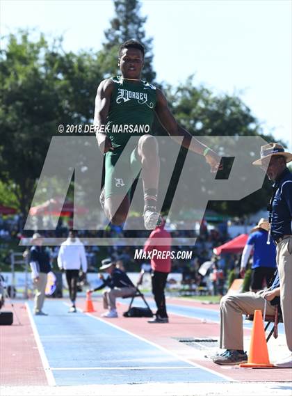 Thumbnail 3 in CIF State Track and Field Championships (Boys Long Jump Qualifying) photogallery.