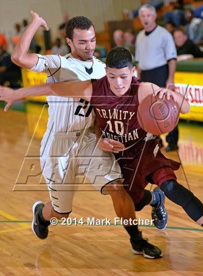 Thumbnail 2 in DeLand vs. Trinity Christian Academy (Gus Gibbs Rotary Tournament) photogallery.