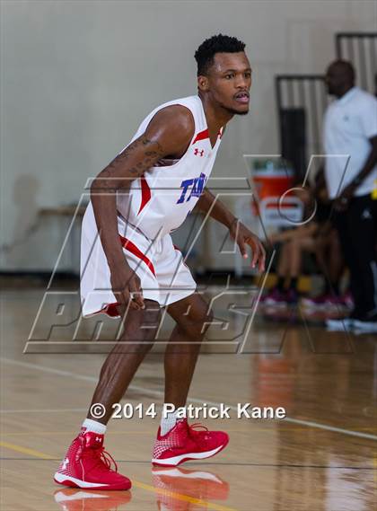 Thumbnail 2 in T.C. Williams vs. Kecoughtan (George Long Holiday Hoops Tournament) photogallery.