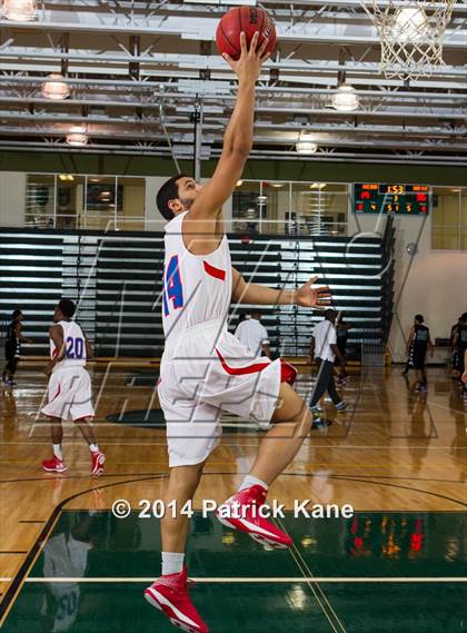 Thumbnail 3 in T.C. Williams vs. Kecoughtan (George Long Holiday Hoops Tournament) photogallery.