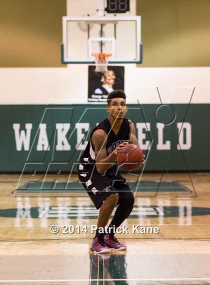 Thumbnail 1 in T.C. Williams vs. Kecoughtan (George Long Holiday Hoops Tournament) photogallery.