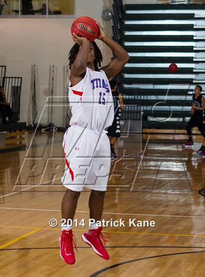 Thumbnail 1 in T.C. Williams vs. Kecoughtan (George Long Holiday Hoops Tournament) photogallery.