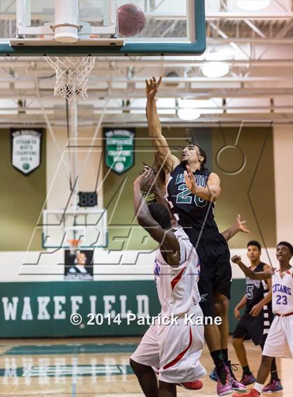 Thumbnail 1 in T.C. Williams vs. Kecoughtan (George Long Holiday Hoops Tournament) photogallery.