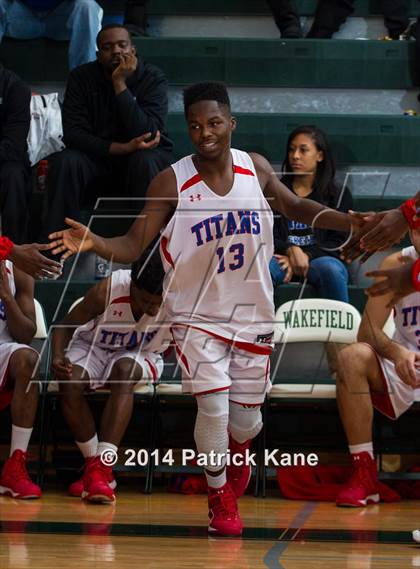 Thumbnail 3 in T.C. Williams vs. Kecoughtan (George Long Holiday Hoops Tournament) photogallery.