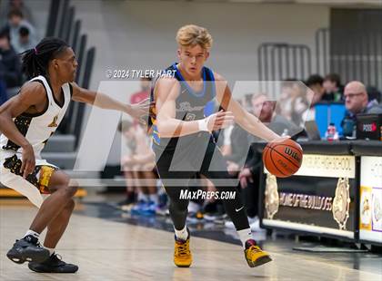 Thumbnail 1 in Fort Wayne Blackhawk Christian vs. Avon (Sneakers for Santa Shootout) photogallery.