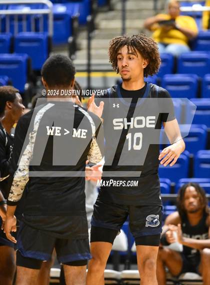 Thumbnail 2 in Shoemaker vs. Fort Bend Marshall (UIL Basketball 5A Region III Semifinal) photogallery.