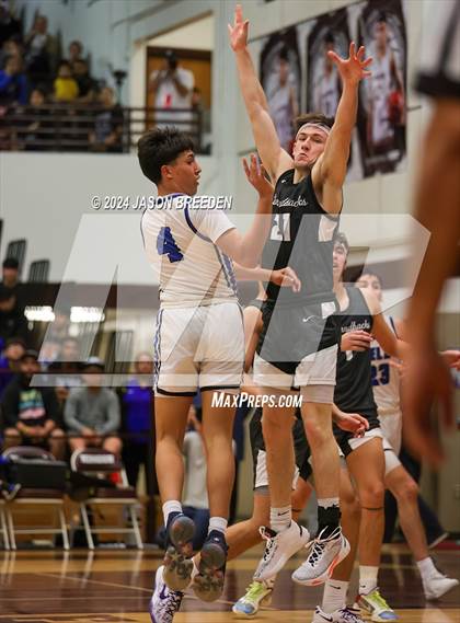 Thumbnail 1 in Pioneer vs. Vela (UIL Basketball 5A Regional Quarterfinal) photogallery.
