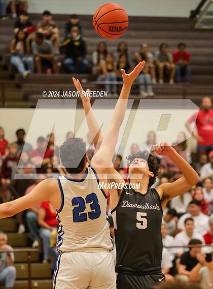 Thumbnail 1 in Pioneer vs. Vela (UIL Basketball 5A Regional Quarterfinal) photogallery.