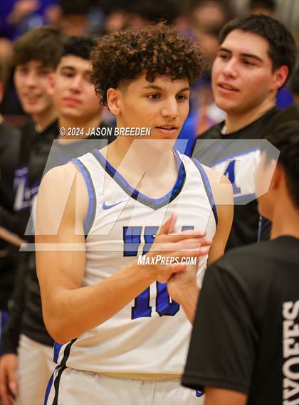 Thumbnail 1 in Pioneer vs. Vela (UIL Basketball 5A Regional Quarterfinal) photogallery.
