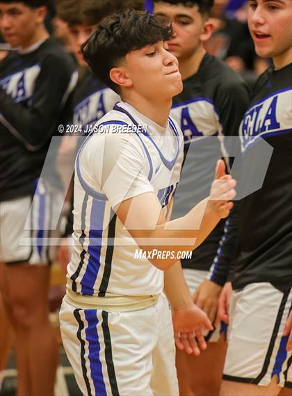 Thumbnail 1 in Pioneer vs. Vela (UIL Basketball 5A Regional Quarterfinal) photogallery.