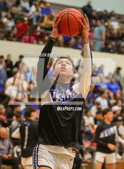 Thumbnail 2 in Pioneer vs. Vela (UIL Basketball 5A Regional Quarterfinal) photogallery.