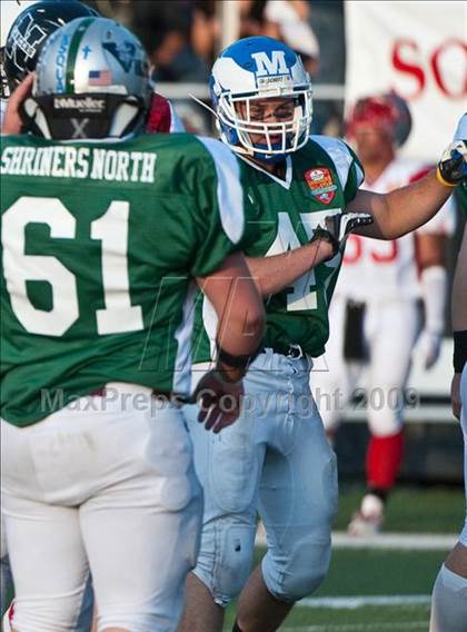 Thumbnail 3 in Shriners Football Classic (North vs South) photogallery.