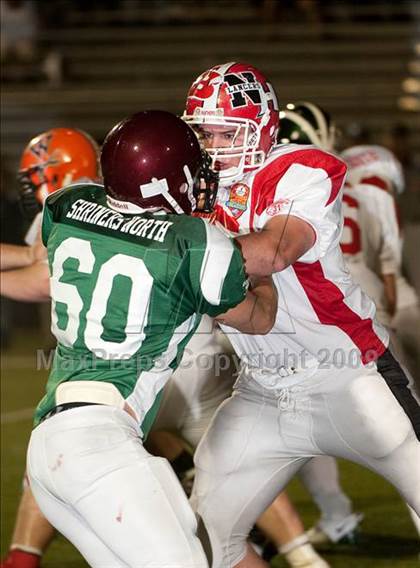Thumbnail 1 in Shriners Football Classic (North vs South) photogallery.