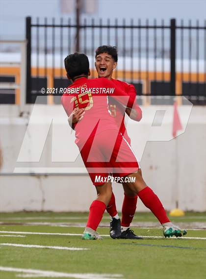 Thumbnail 1 in Waxahachie vs. Rockwall-Heath (UIL 6A Area Playoff) photogallery.