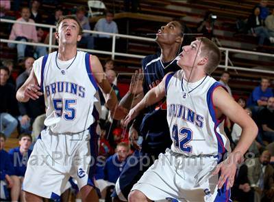 Cherry Creek's Trey Eckloff and Jack Elway clean the boards in 2nd round 5A action.