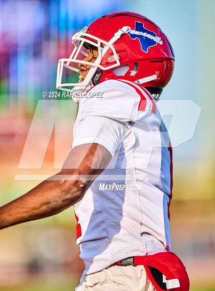 Thumbnail 3 in The Woodlands vs. Duncanville (UIL 6A D1 Football Regional) photogallery.
