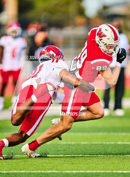 Thumbnail 3 in The Woodlands vs. Duncanville (UIL 6A D1 Football Regional) photogallery.