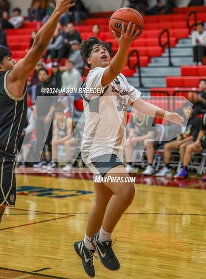 Thumbnail 2 in Edcouch-Elsa vs Pioneer (Sharyland ISD Thanksgiving Classic) photogallery.