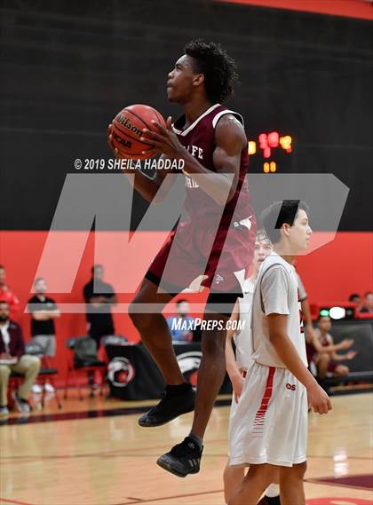 Thumbnail 2 in Santa Fe Catholic vs Carrollwood Day (Sun Bash Tournament) photogallery.
