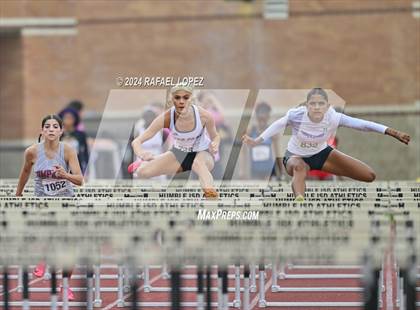 Thumbnail 2 in UIL Track & Field 6A Region 3 Regional Final Preliminaries (100 Meter Hurdles) photogallery.