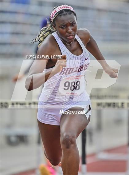 Thumbnail 1 in UIL Track & Field 6A Region 3 Regional Final Preliminaries (100 Meter Hurdles) photogallery.