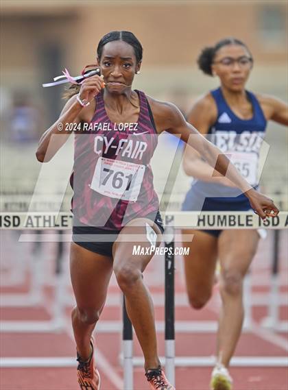 Thumbnail 1 in UIL Track & Field 6A Region 3 Regional Final Preliminaries (100 Meter Hurdles) photogallery.