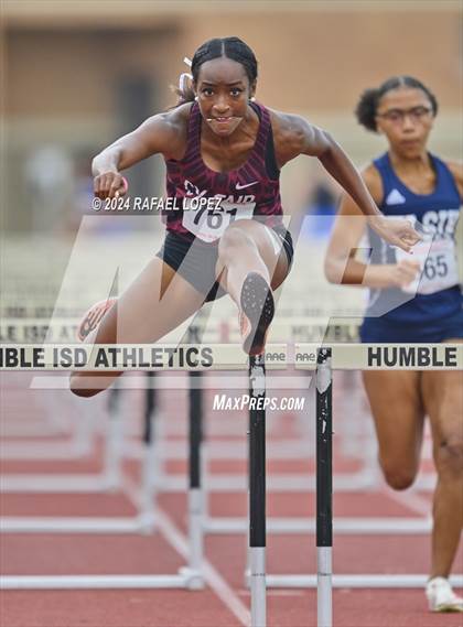 Thumbnail 1 in UIL Track & Field 6A Region 3 Regional Final Preliminaries (100 Meter Hurdles) photogallery.