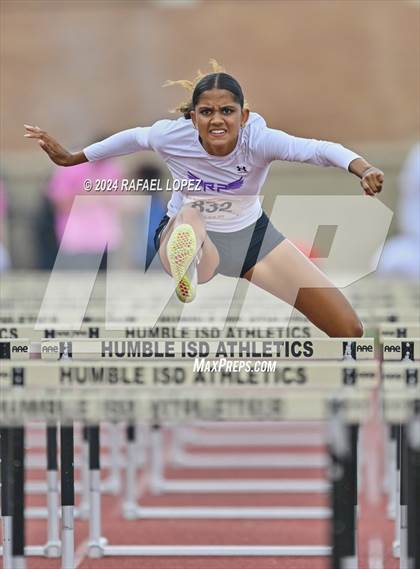 Thumbnail 1 in UIL Track & Field 6A Region 3 Regional Final Preliminaries (100 Meter Hurdles) photogallery.